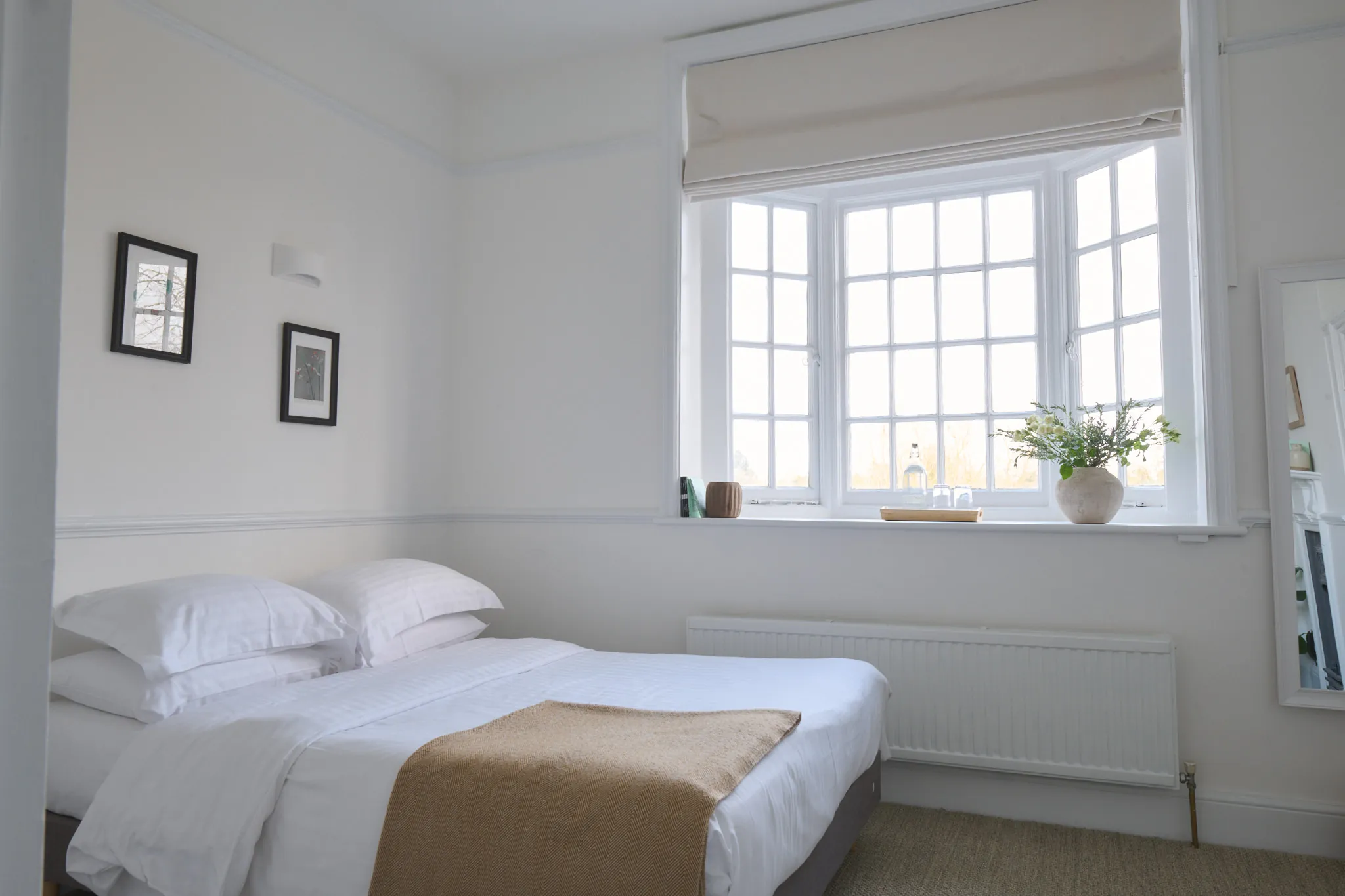 The bed and the bay window in Gold